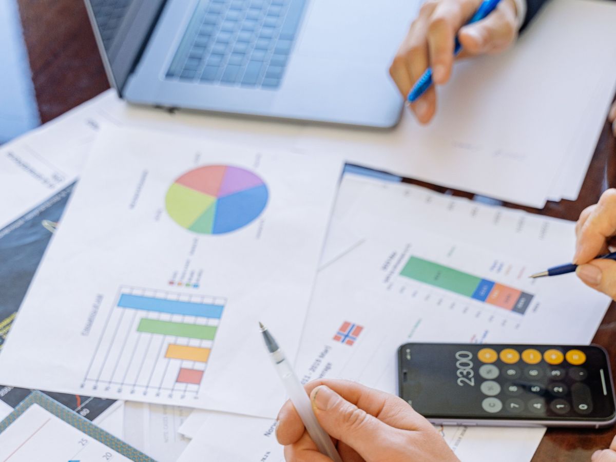 Professional accounting consultation reviewing financial reports and business performance